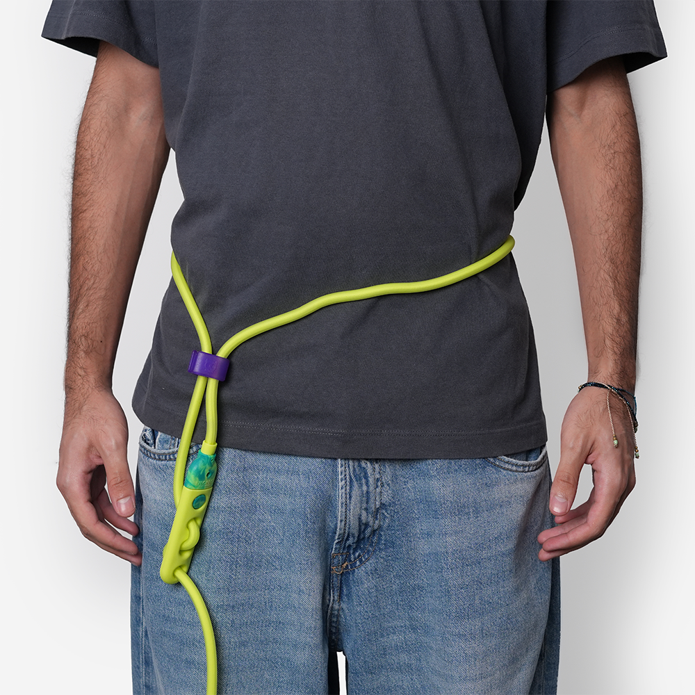 Zee.Dog Fluo Neopro Hands-Free Dog Leash worn by dog owner