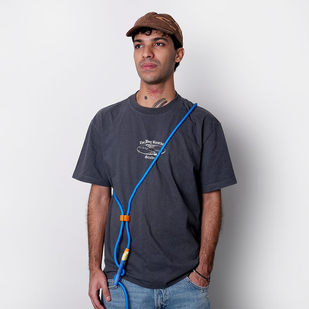 Zee.Dog Sapphire Neopro Hands-Free Dog Leash worn by dog owner